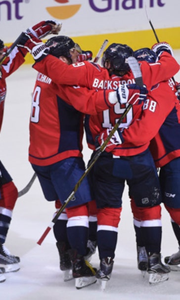 Capitals lose 3-goal lead, recover to beat Bruins in OT